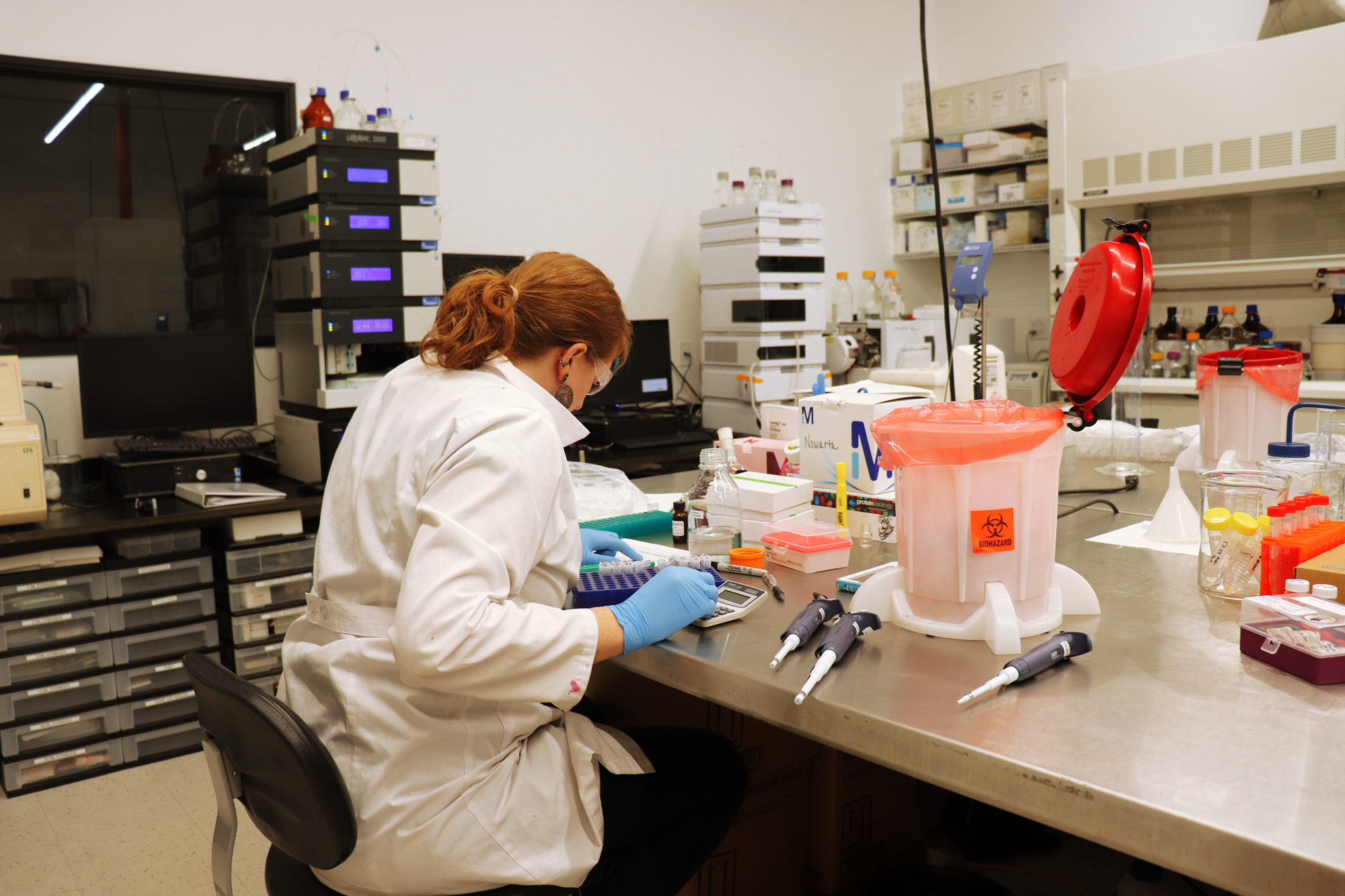 Lab bench layout with waste container and tools